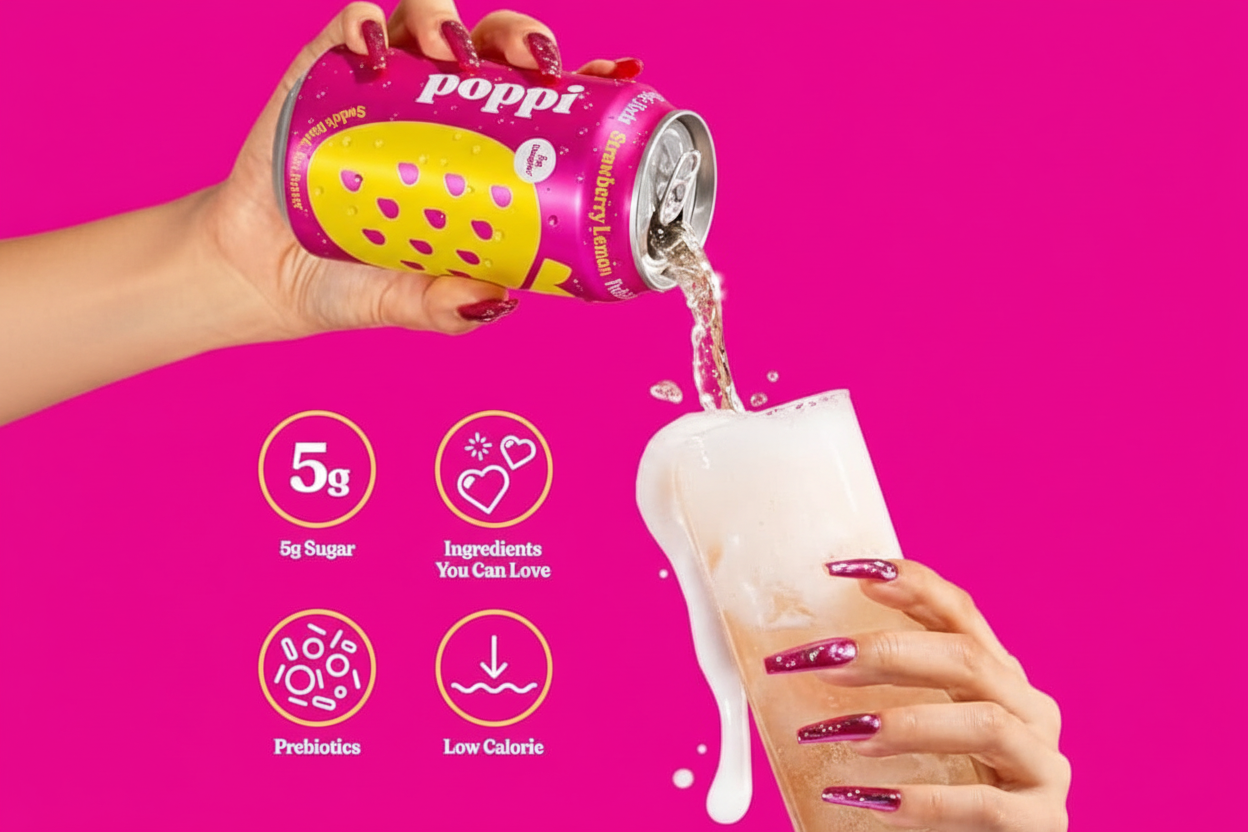 Poppi Strawberry Lemon soda being poured into glass prebiotics low calorie 5g sugar